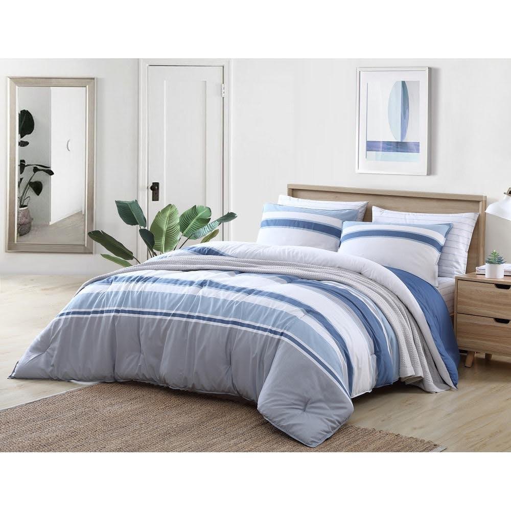 Bed Bath and Beyond cotton reversible comforter on a bed