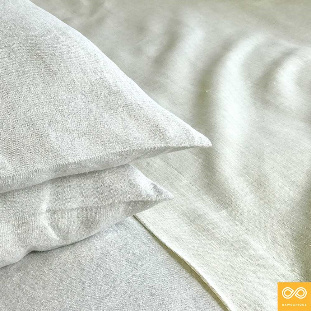 Two pillows and a matching sheet from the Rawganique organic linen bedding collection