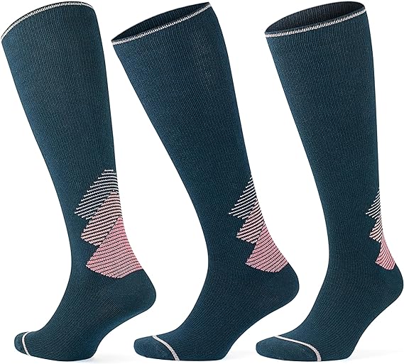 A pair of turquoise and pink merino wool compression socks from GoWith