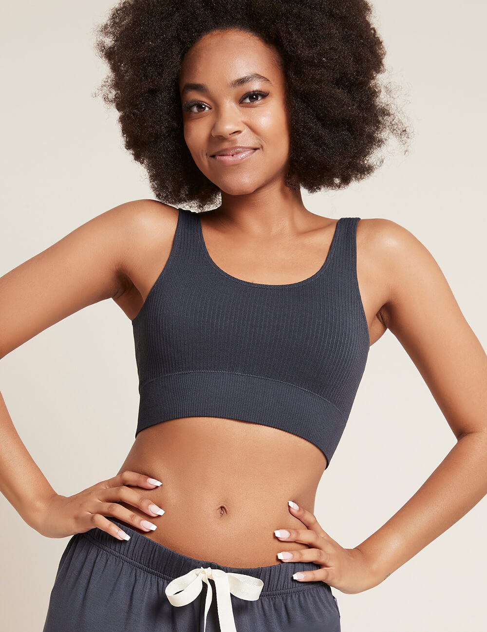Woman wearing the ultimate comfort with Boody's BPA-free ribbed seamless sports bra.
