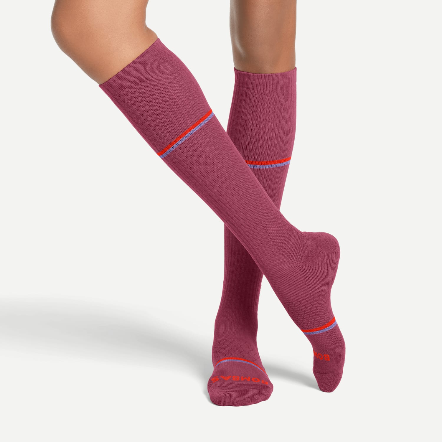 Bombas berry knee-high socks with striped accents.
