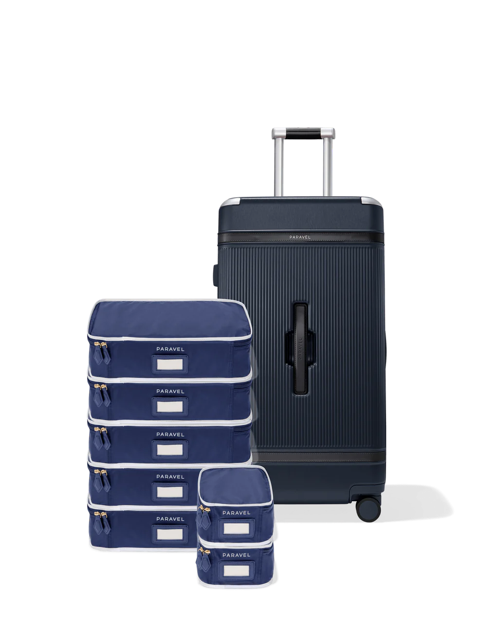 A stylish and sustainable Paravel Aviator Trunk Set, perfect for extended trips, made from recycled materials and featuring a sleek black finish.