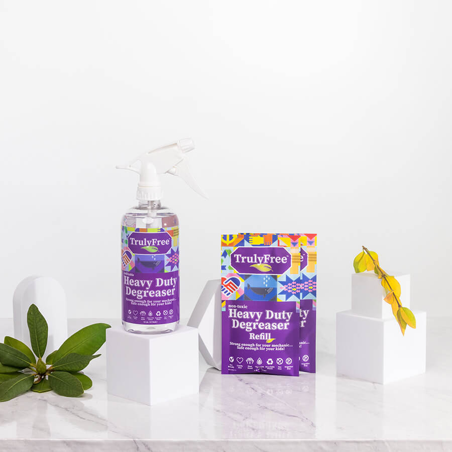 Eco-friendly TrulyFree Heavy Duty Degreaser bottle and refill pouch.
