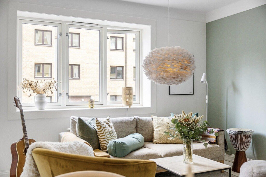 Linen throw pillows on a couch in an airy room