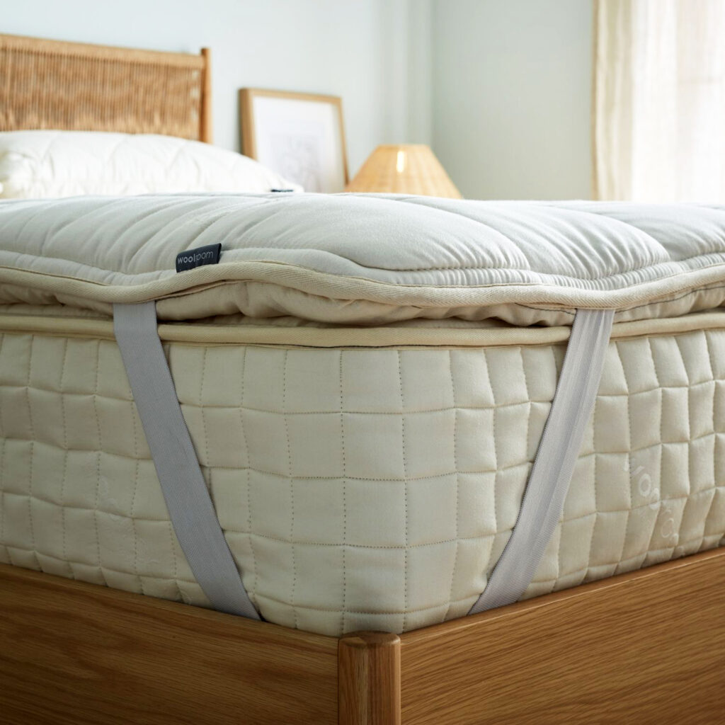 Woolroom’s Wooly Mattress Topper on top of a Woolroom mattress