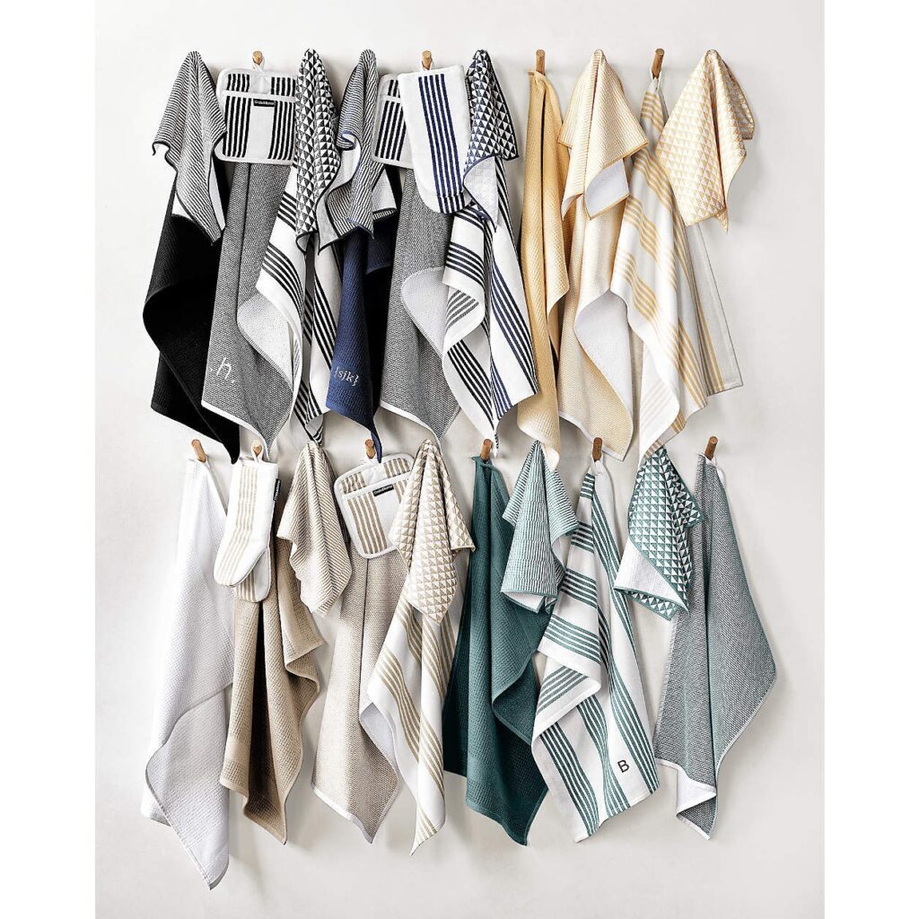 A collection of eco-friendly kitchen towels in different colors and patterns
