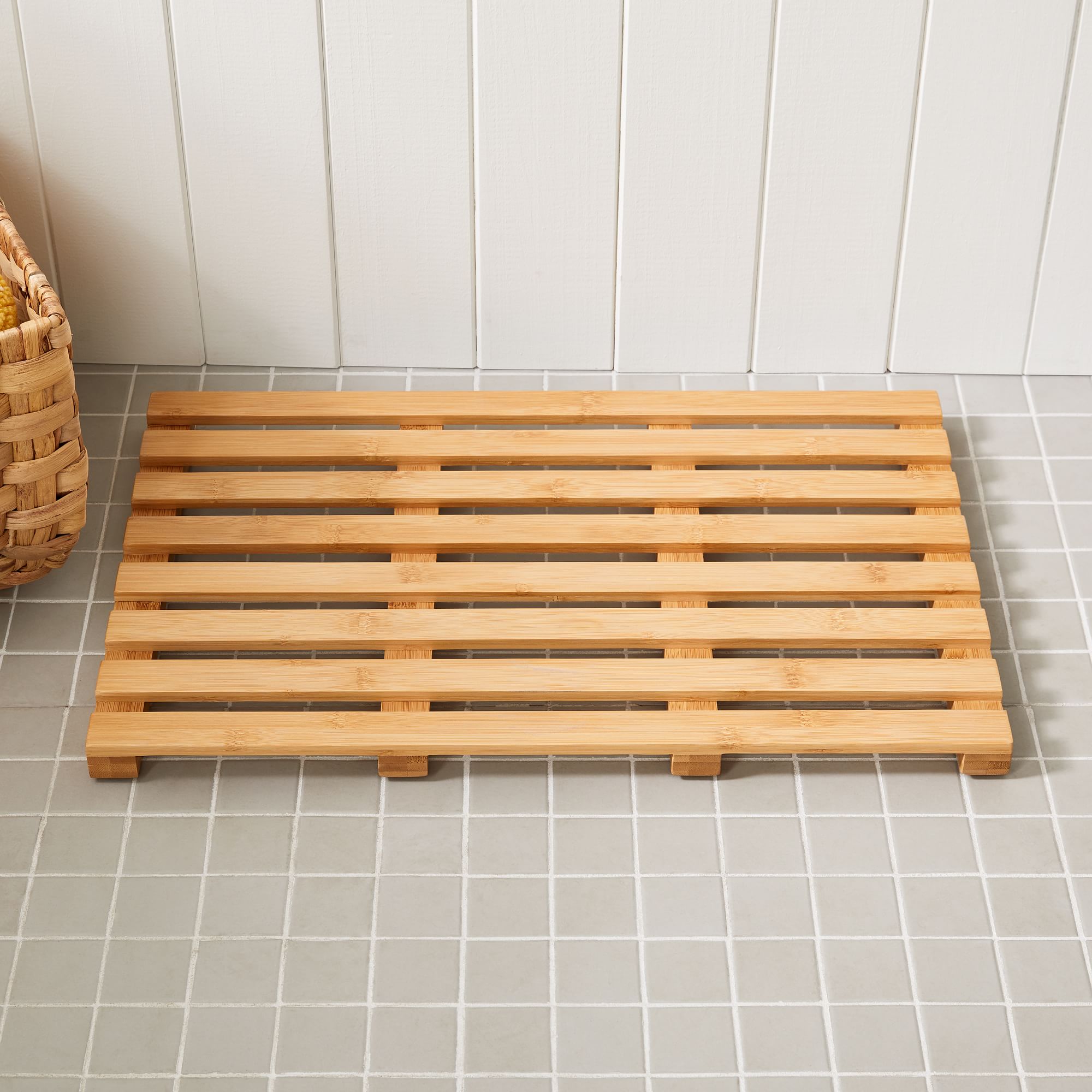 Hinoki wooden bath mat: durable, sustainable, and slip-resistant design.