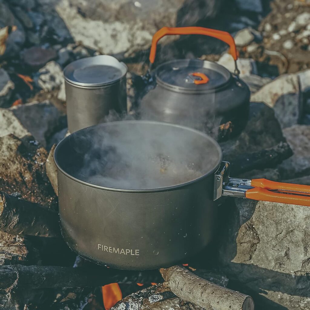 A durable stainless steel camping cookware featuring Fire Maple’s sleek cooking pan over a campfire.