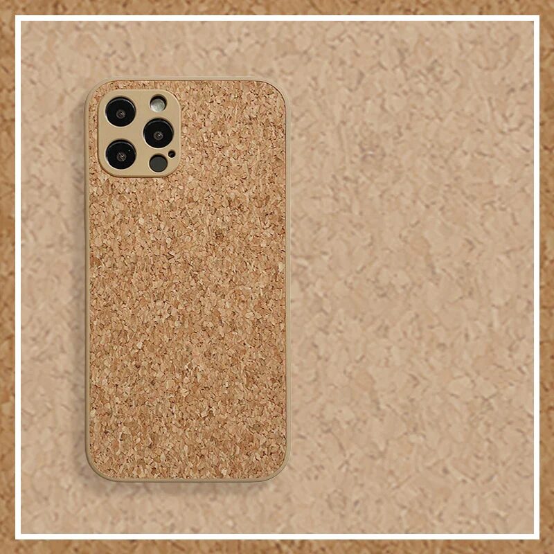 Minimalist iPhone case made from natural cork with a textured, eco-friendly finish against cork background.