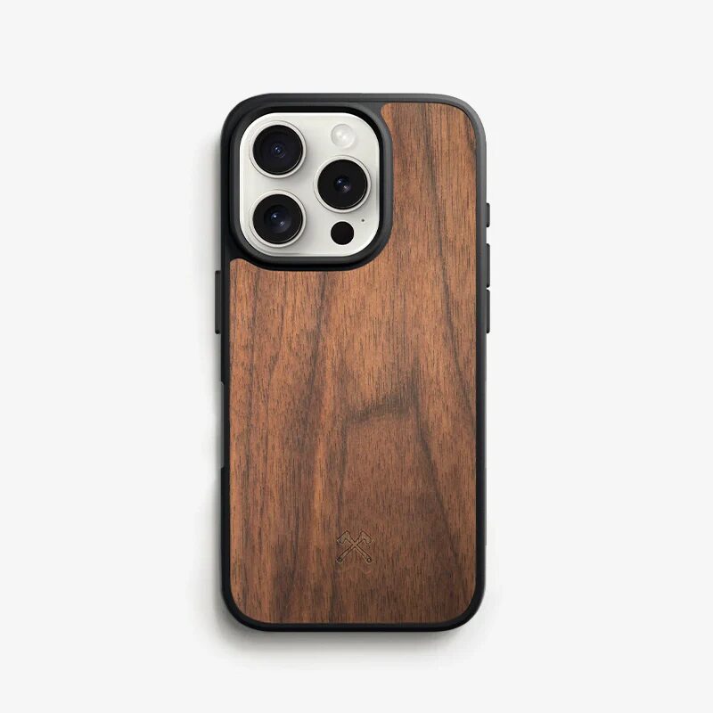 Minimalist iPhone case made of natural walnut wood with black bumper and engraved logo at bottom.