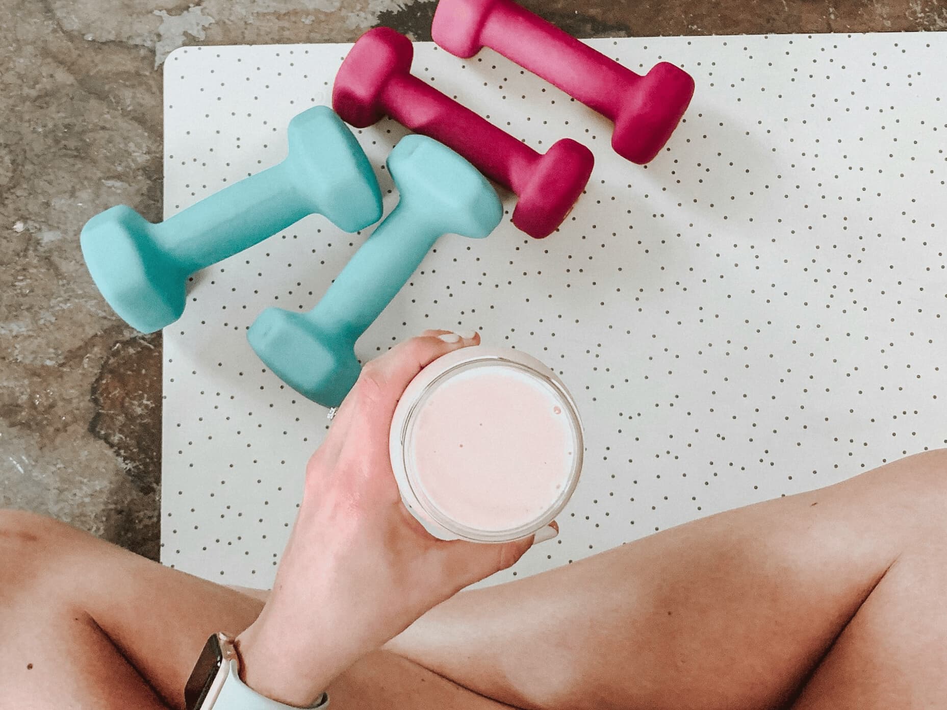 lead free protein powder in a shake near dumbbells